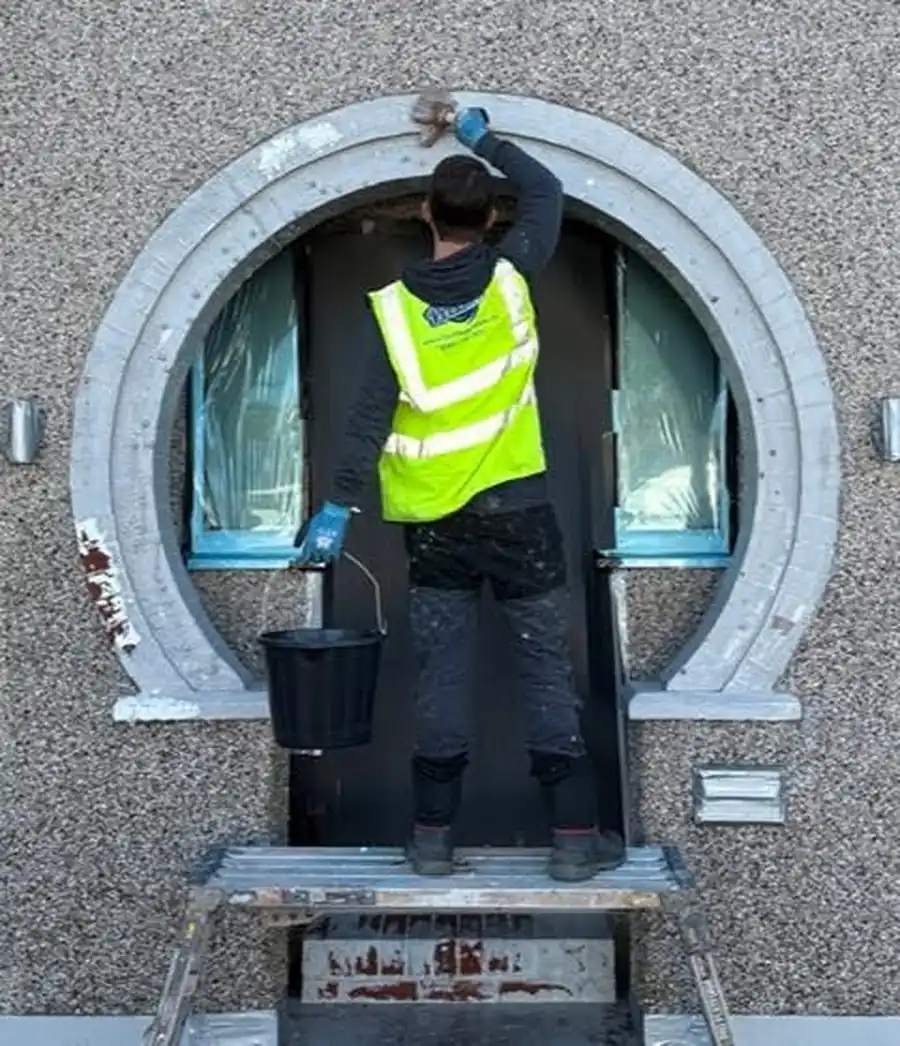 brick-arch-paint-removal-applying-paint-softener.webp